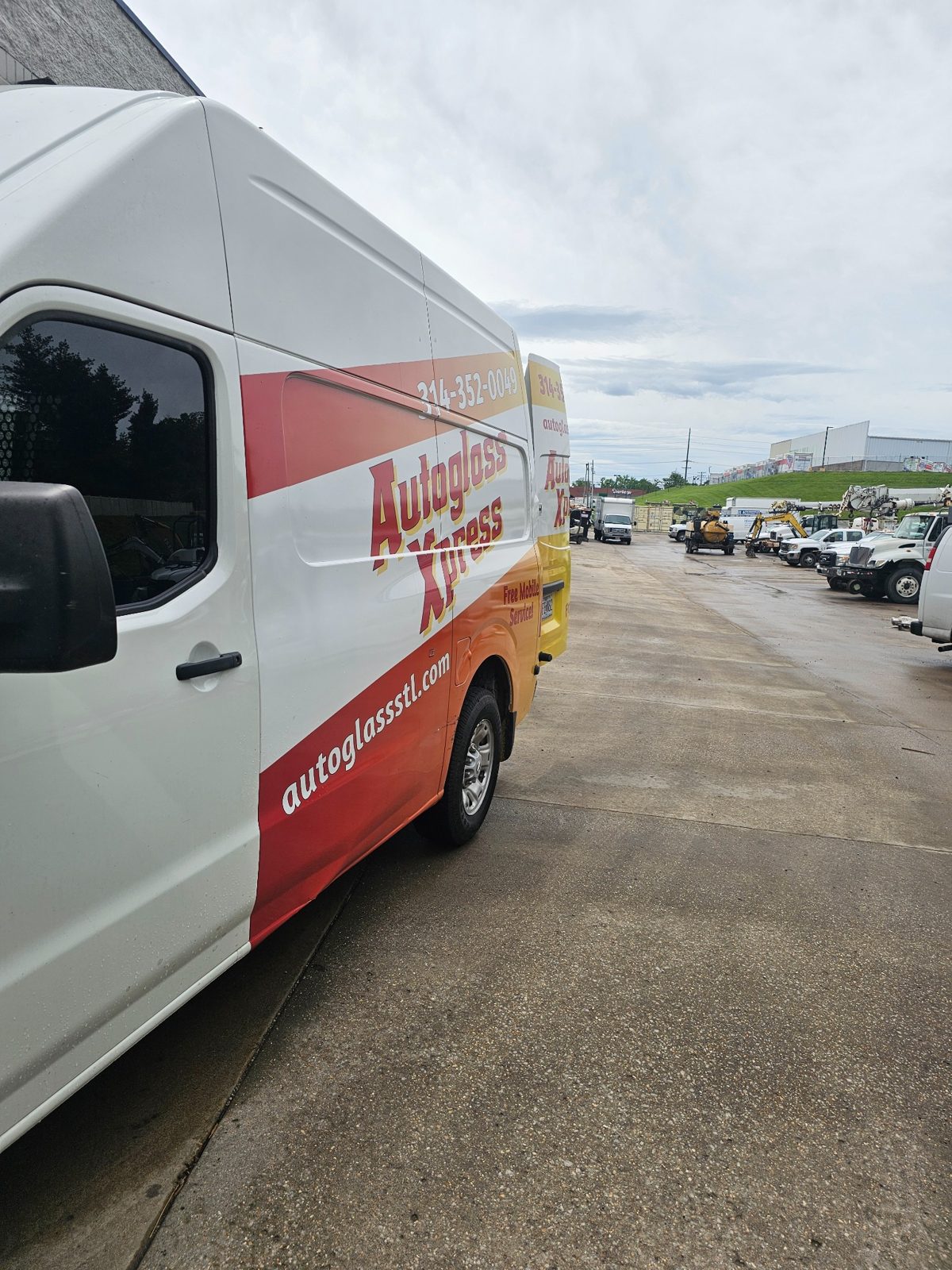 Auto Glass Xpress fleet auto glass service van at commercial job site in St. Louis Missouri